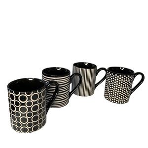 Food Network black and white‎ multi patterned coffee mugs. 4” height.